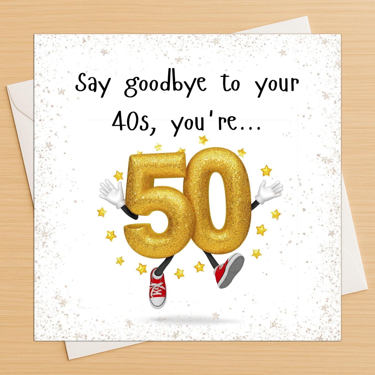 Birthday card with gold number '50' and text 'Say goodbye to your 40s, you're...' on a white envelope