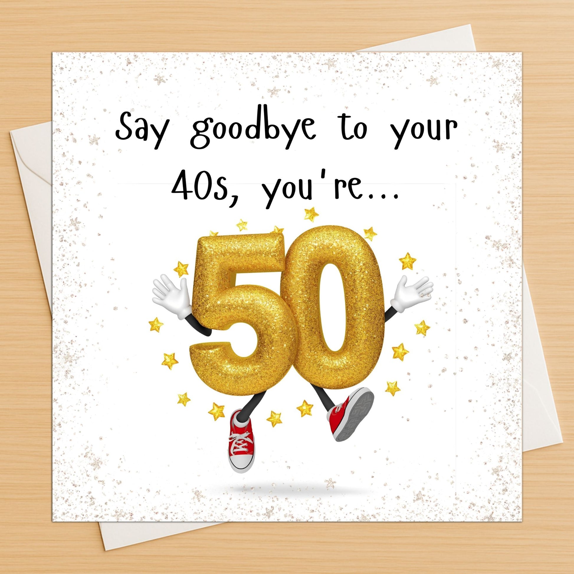 Birthday card with gold number '50' and text 'Say goodbye to your 40s, you're...' on a white envelope