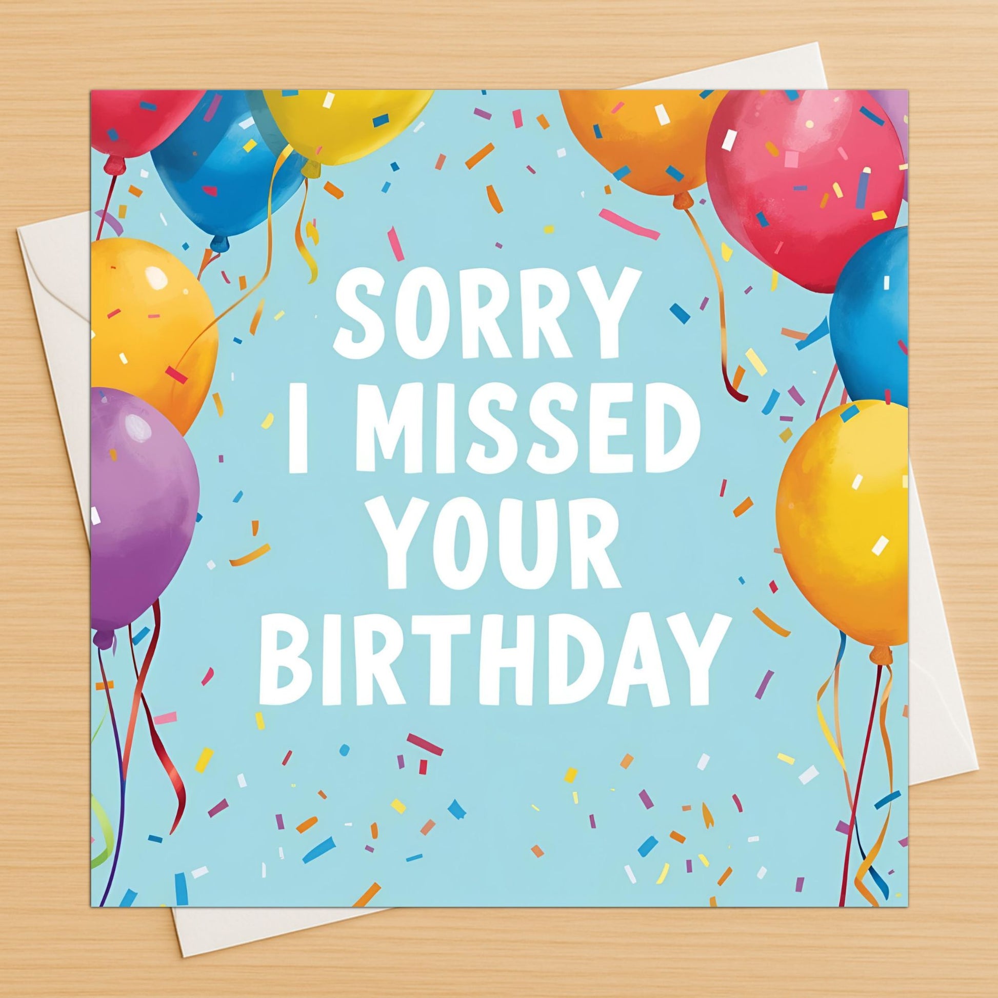 Sorry I missed your birthday card with balloons and confetti on wooden table