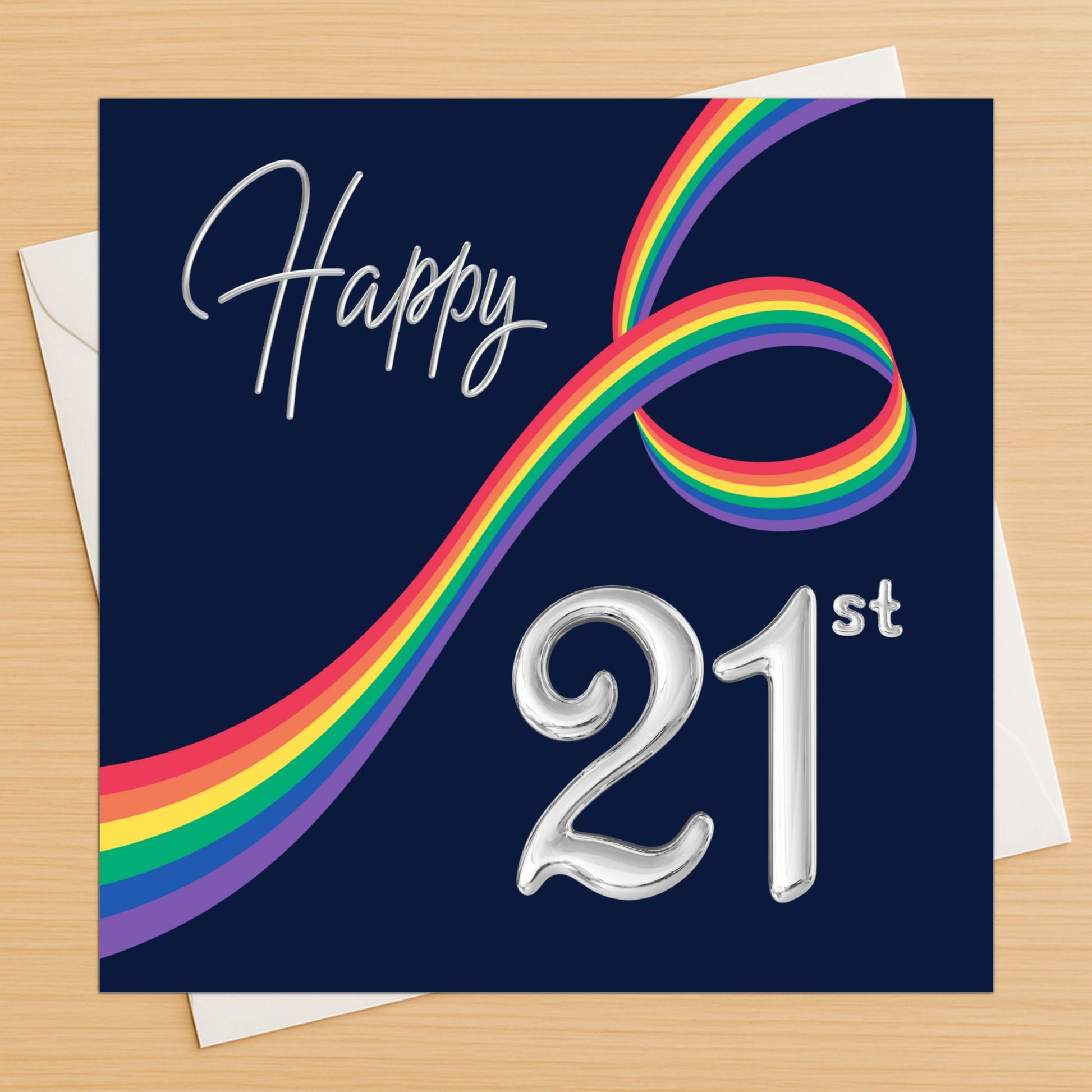 Greeting card with rainbow design and 'Happy 21st' text on a blue background